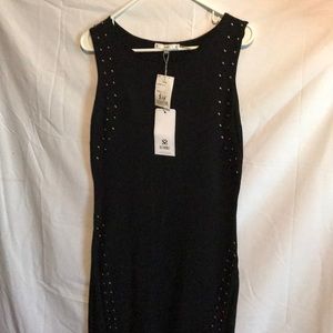 A black dress with beads down each side